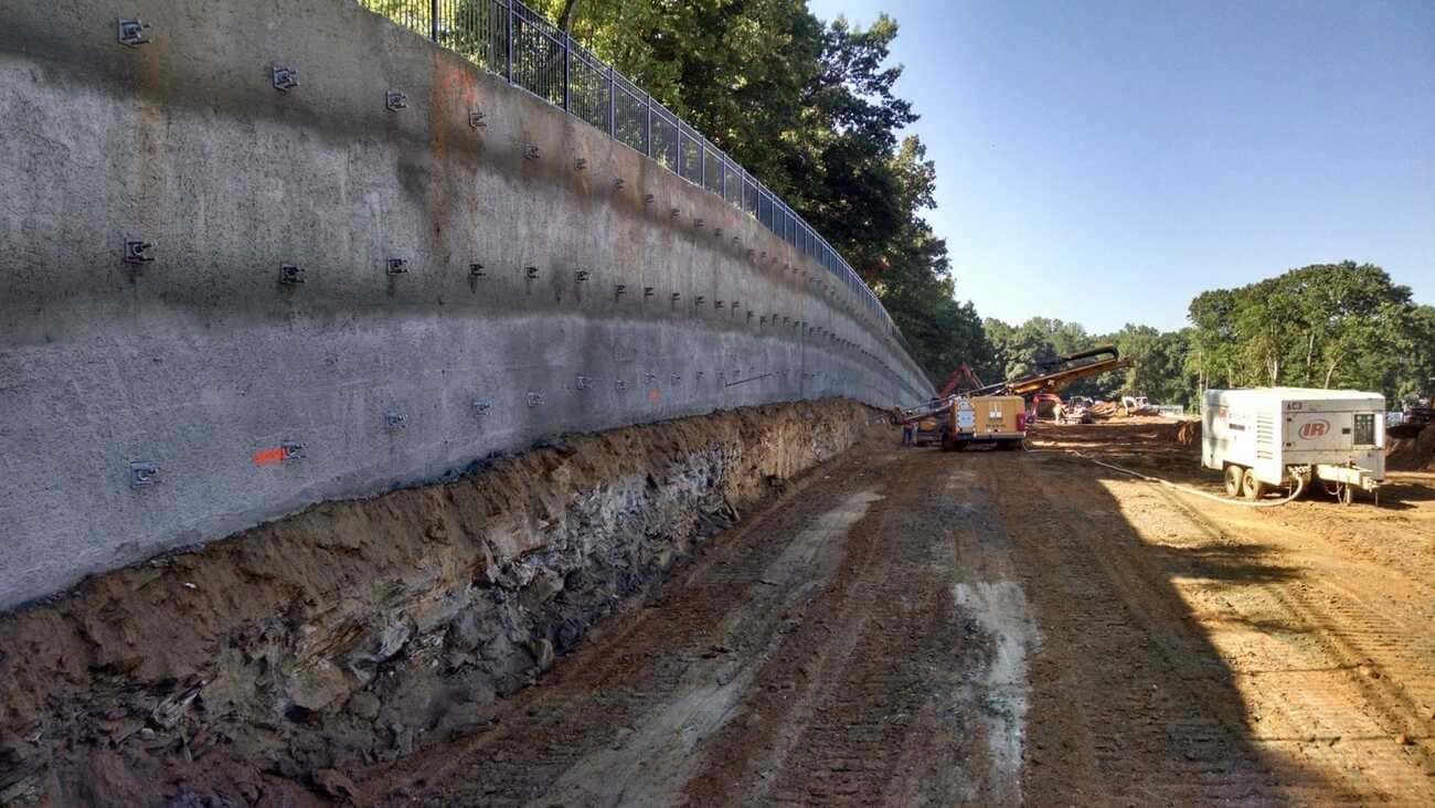 Photo showing installation of a soil nail wall