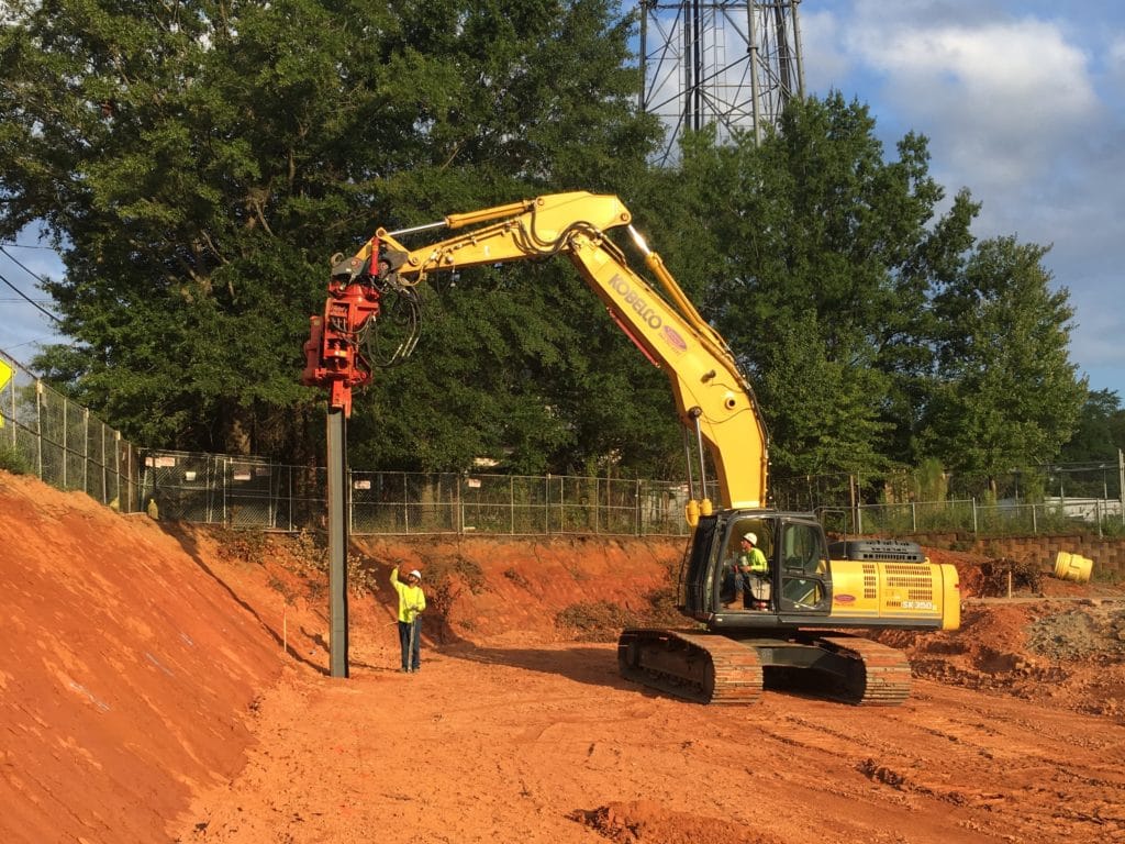 Photo of pile being installed with vibratory hammer